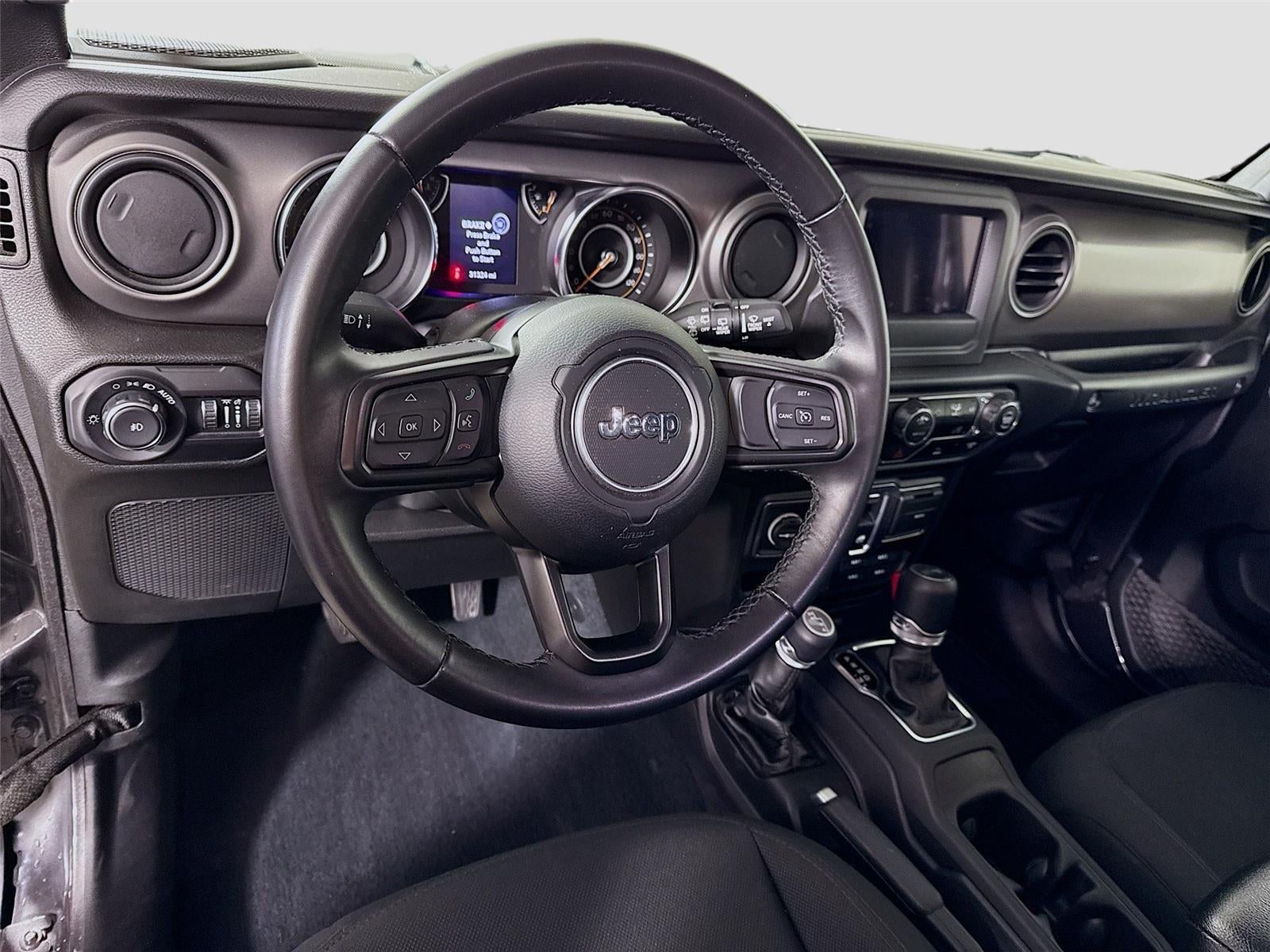 Used 2022 Jeep Wrangler Sport S with VIN 1C4GJXAN2NW206665 for sale in Faribault, Minnesota
