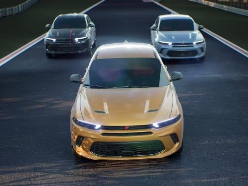 2023 Dodge Hornet times three driving down the road