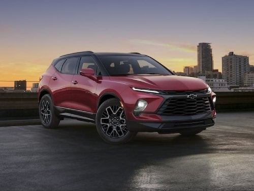 2024 Chevrolet Blazer exterior view of vehicle parked outside a city at night
