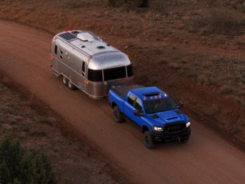 2024 RAM 2500 towing a trailer