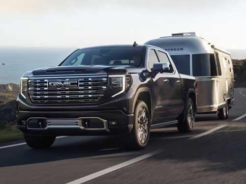 2024 GMC Sierra HD towing a camper