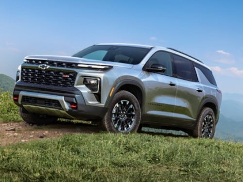 2024 Chevrolet Traverse Z71 parked on a mountain top on a sunny day