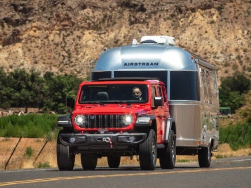 2024 Jeep Wrangler 4xe towing an airstream