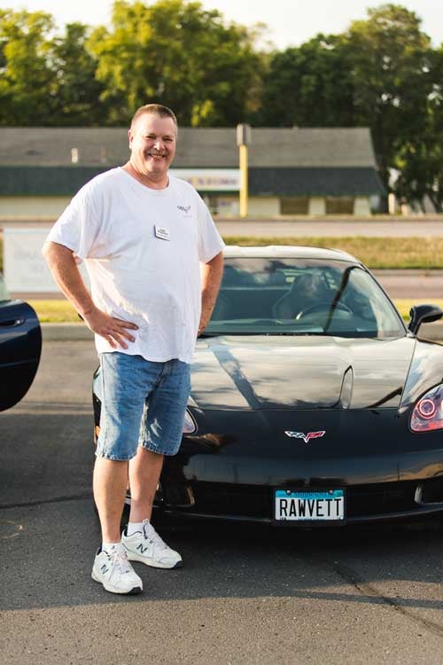 Man with his Corvette