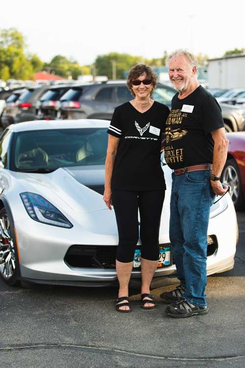 Couple with their Corvette